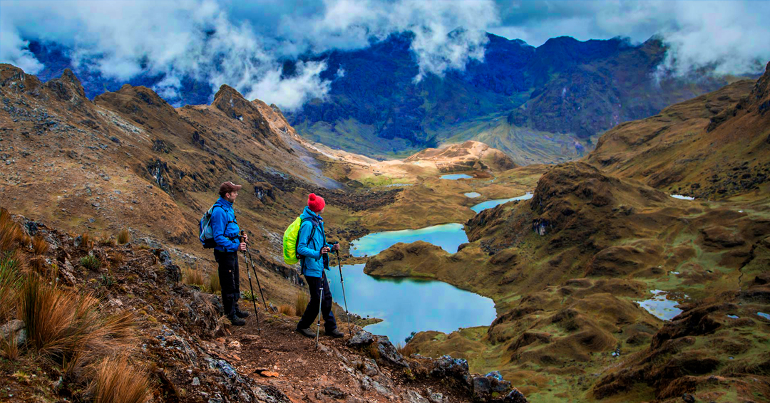 Traditional Andean community and high-altitude landscape along the Lares Valley Trek organized by Peru Grand Travel.