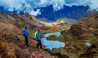 Traditional Andean community and high-altitude landscape along the Lares Valley Trek organized by Peru Grand Travel.