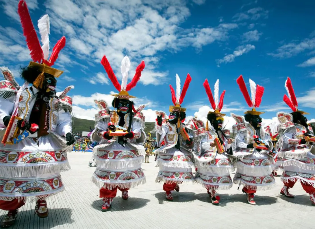 Traditional dancers in colorful costumes performing during festivals and celebrations in Peru, showcasing the country’s rich cultural heritage and joyful spirit.